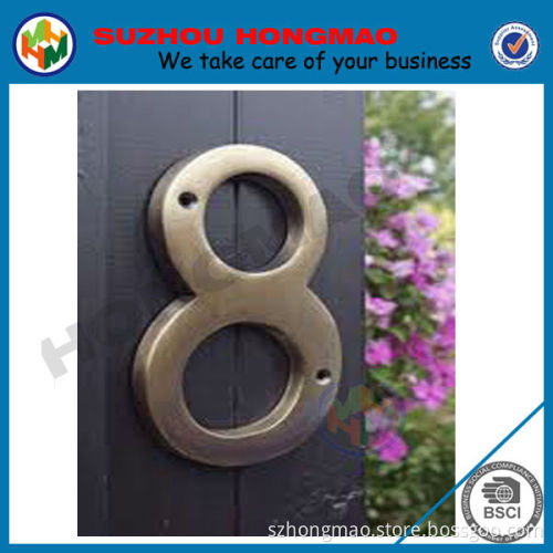Brushed stainless steel House number sign